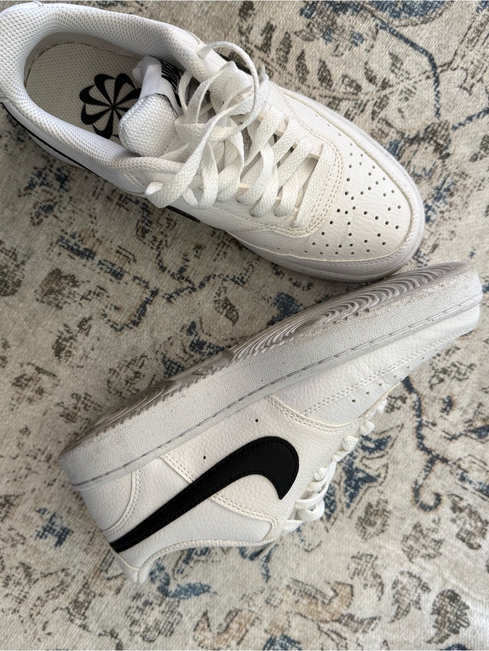 Nike White Low-Top Sneakers with Black Swoosh